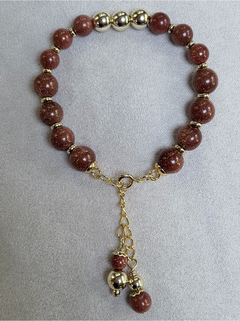 Brown Goldstone beaded Bracelet.14K gold filled beads,dangles.7.8” w 1” extender